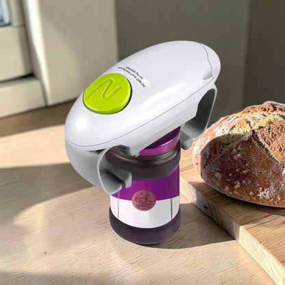 Hands-Free Electric Jar Opener on a jar beside fresh bread